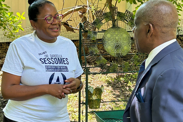 Dr. Darcella Sessomes speaking to a supporter